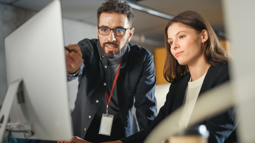 Image of people at screen planning collections recovery